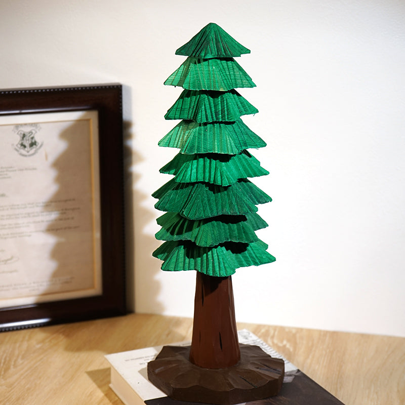 Large wooden Christmas tree with eight layered green tiers and a carved wooden base