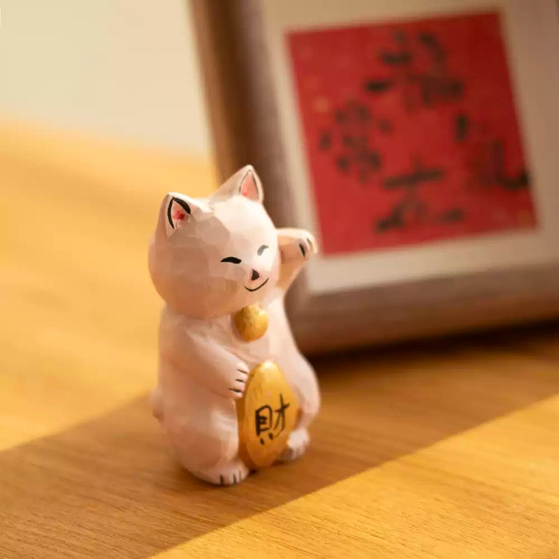 Maneki neko figurine angled view