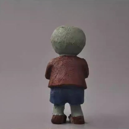 Back view of hand-carved Plants vs. Zombies zombie wooden sculpture
