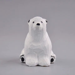 Polar bear figurine front view with black paw pads