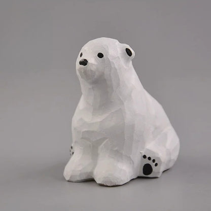 Sitting polar bear wood carving angled view