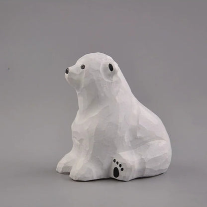 Sitting polar bear wood carving side view