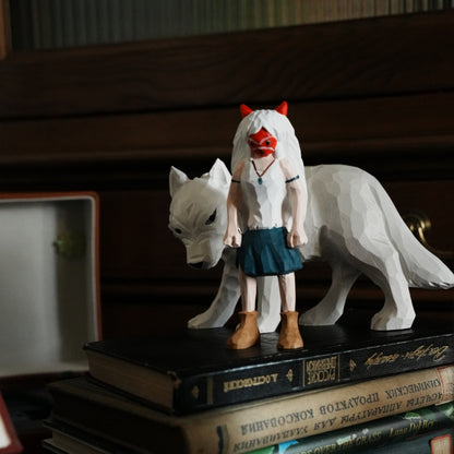 wooden Princess Mononoke figurine standing on stacked books