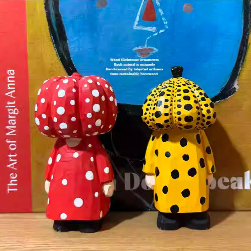 Red and yellow polka dot pumpkin head wooden figurines set