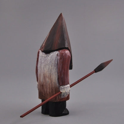 Angled back-side view of the Pyramid Head wooden figure with spear, showcasing the hand-painted coat details.