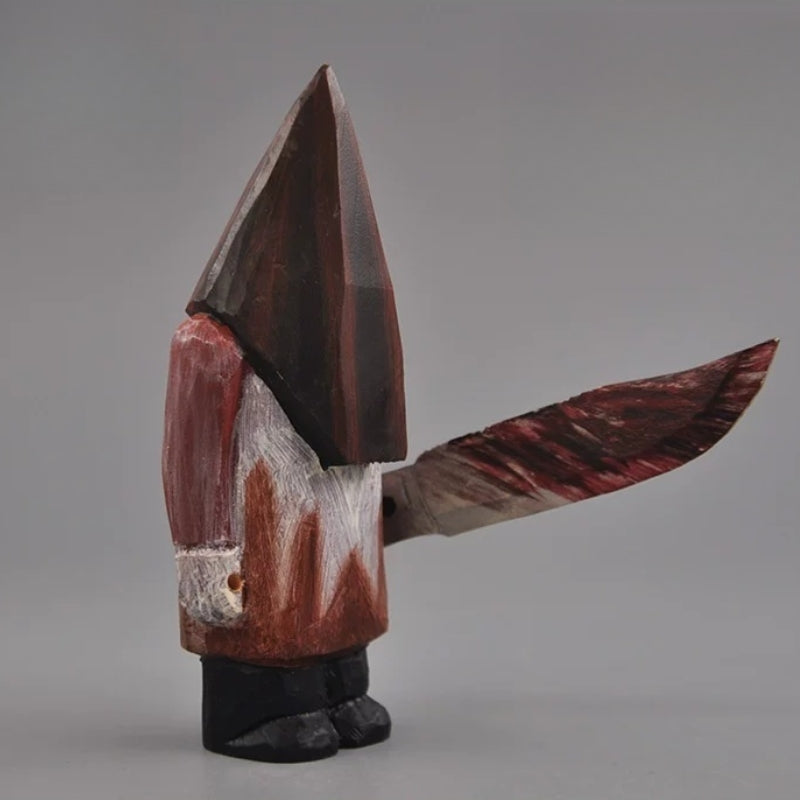 Pyramid Head wooden statue with knife side view