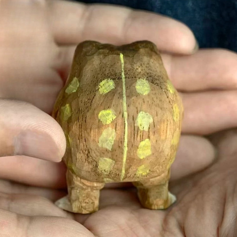 Rain frog figurine back with yellow spots