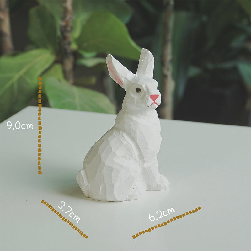Seated white wooden bunny figurine with pink inner ears and nose, shown with dimension labels