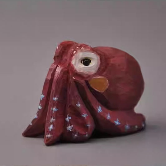Red octopus wood sculpture front view