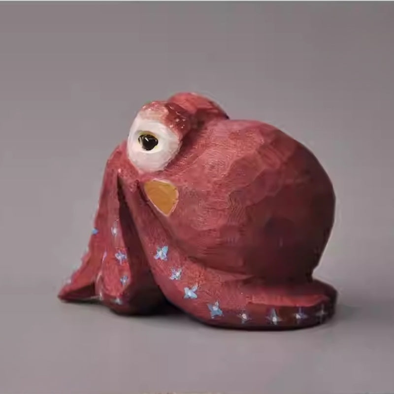 Red octopus wood sculpture side view