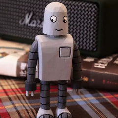 Tin robot wooden figure inspired by Robot Dreams