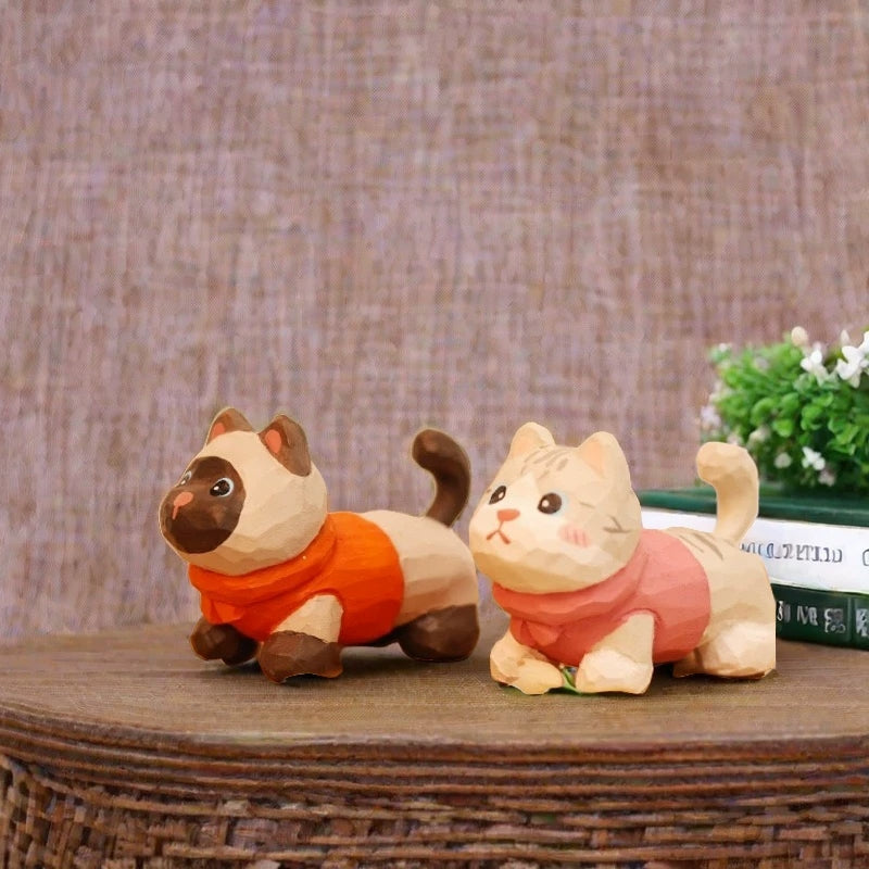 Siamese and cream tabby kitten figurines