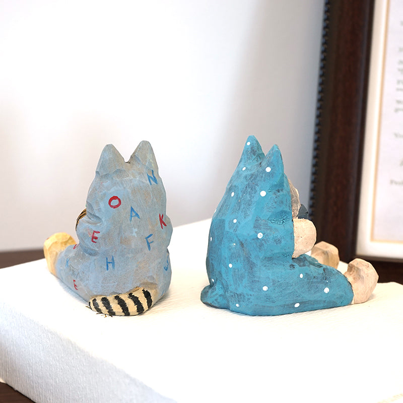 Rear view of sitting cat wooden phone holder