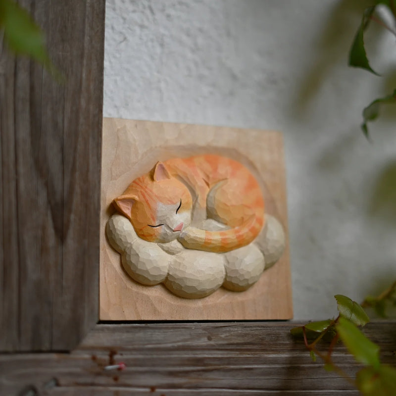 Sleeping cat cloud wood carving outdoor scene