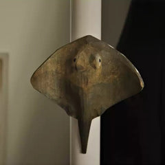 Stingray magnet mounted on a white door frame