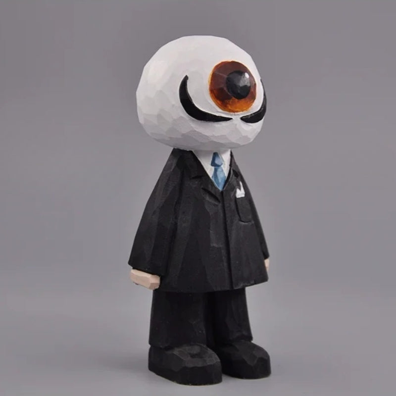 Three-quarter view of the eyeball figure in a black suit with a blue tie and curled mustache