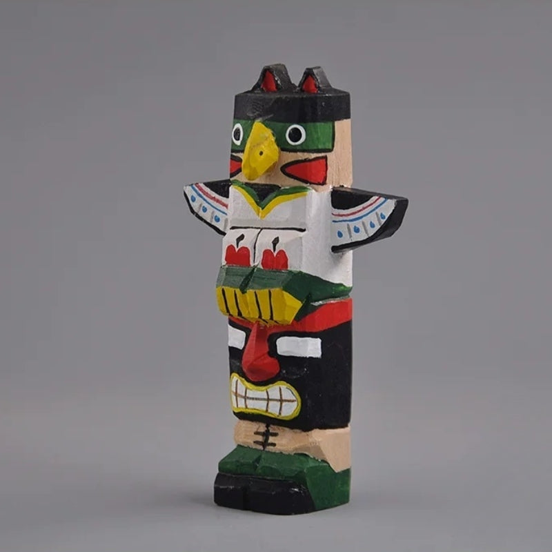 Front view of stacked totem pole figures hand-painted in color