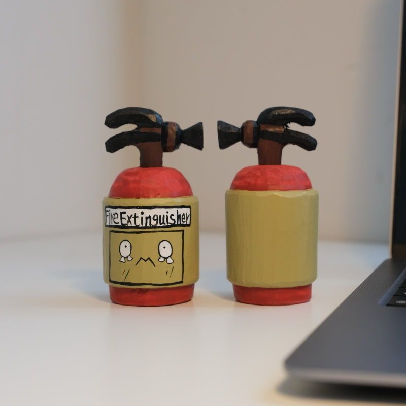 Fire extinguisher figurine front and back view