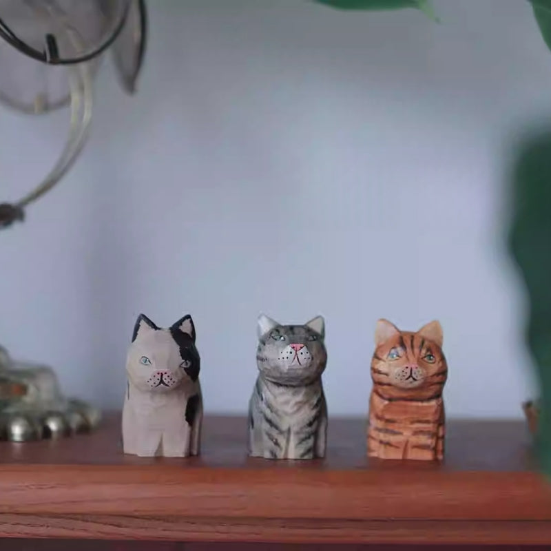 Vintage cat wooden figurine set display