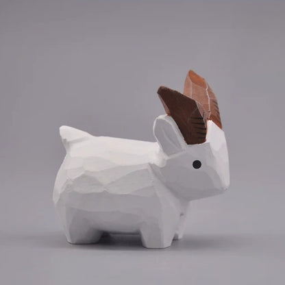 White goat figurine viewed from the right side