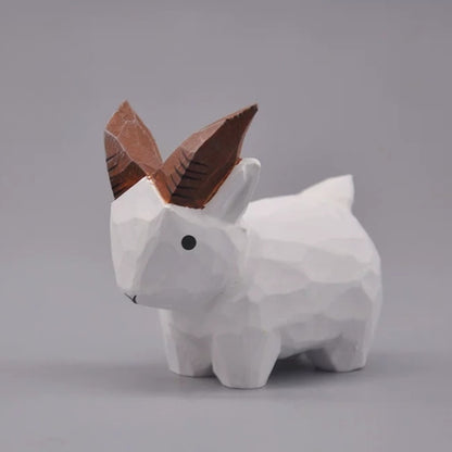 White goat figurine in a three-quarter side view