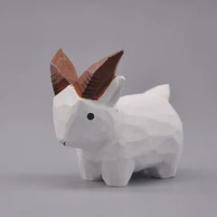 White goat figurine in a three-quarter side view