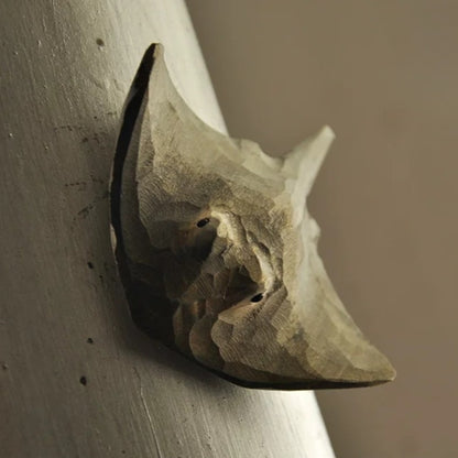 Wood carved stingray magnet side profile