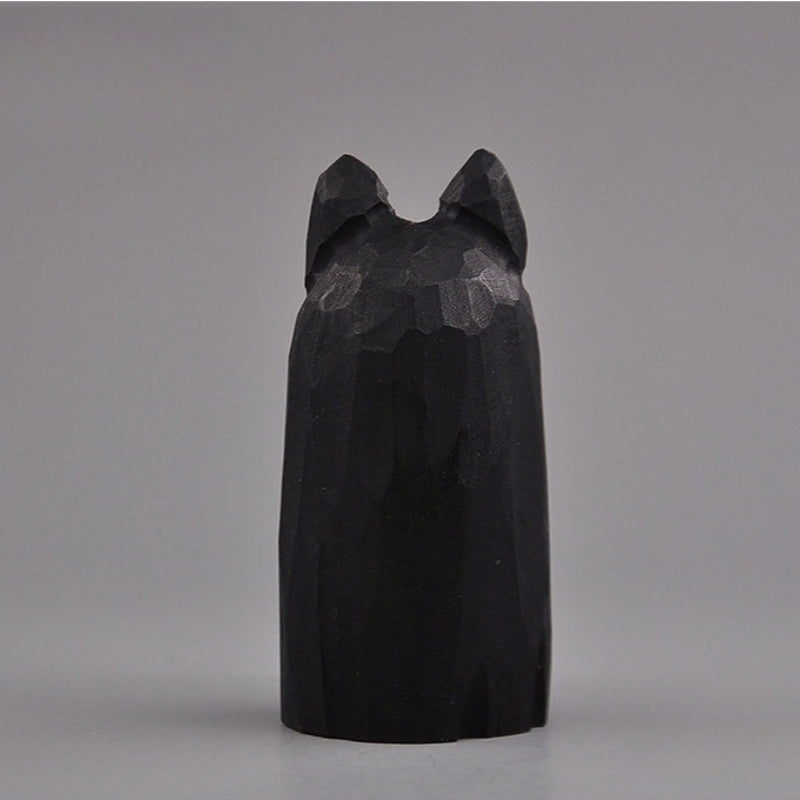 wooden black cat figurine back view