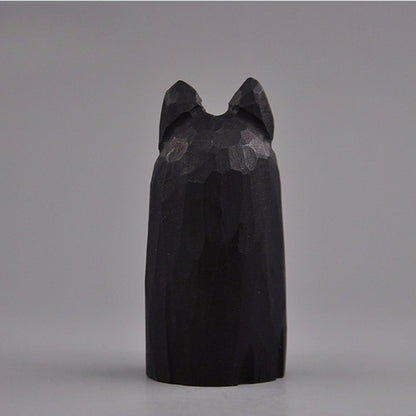 wooden black cat figurine back view