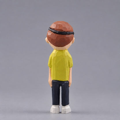 Rear view of wooden Evil Morty showing brown hair, a black eyepatch strap, and a yellow shirt