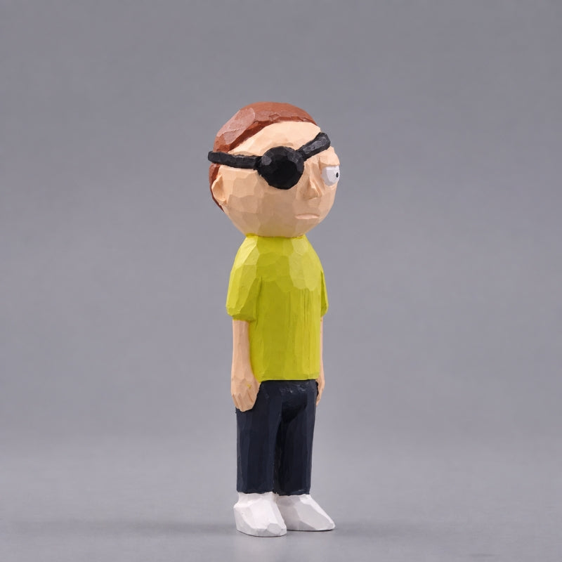 Wooden Evil Morty viewed from the eyepatch side, with carved yellow sleeves and white shoes