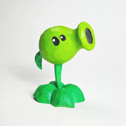 Green wooden Peashooter seen at an angle, showing its round head and narrow stem