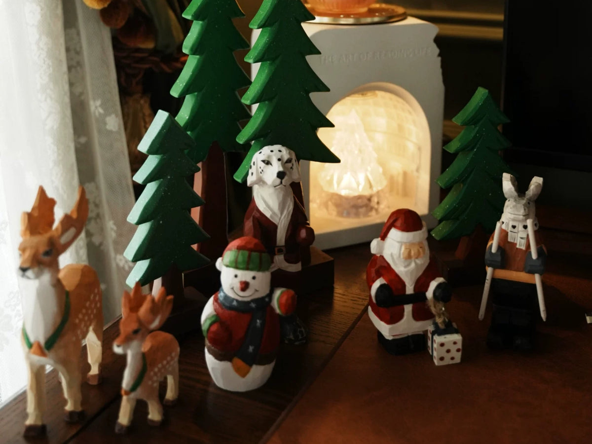 A festive selection of hand-carved Christmas wooden gifts