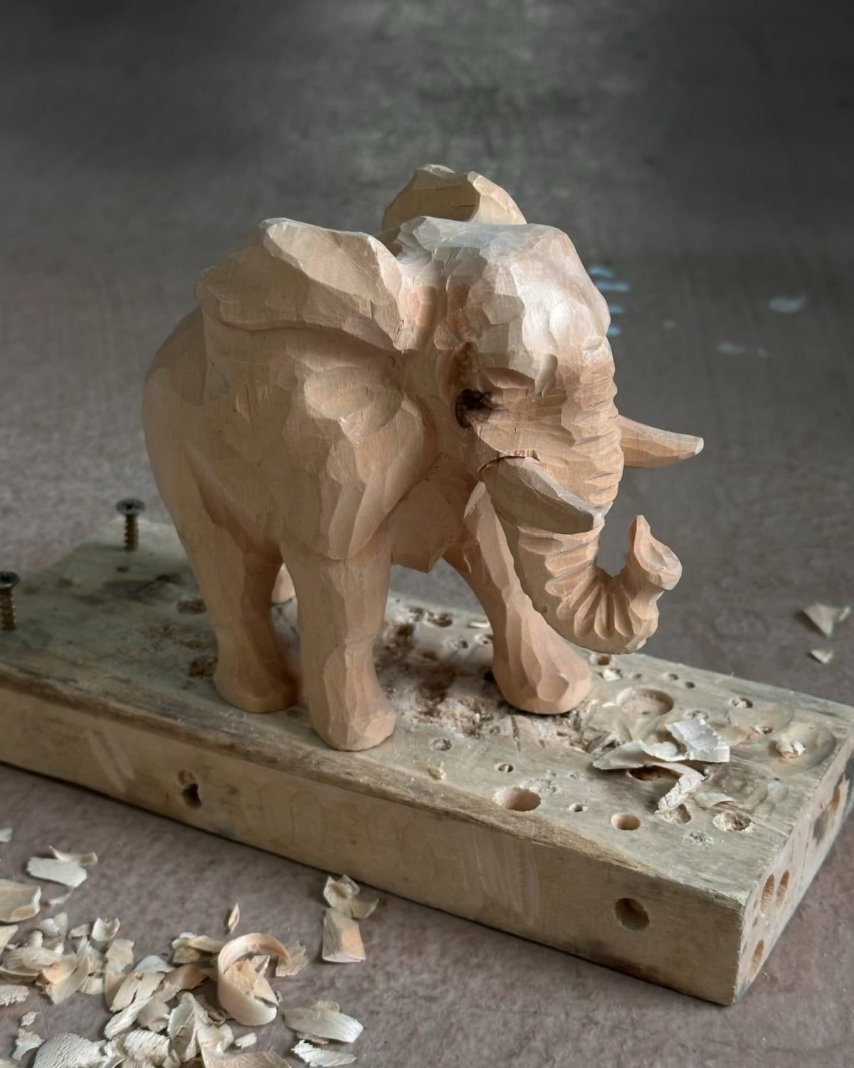 Close-up detail of a hand-painted wooden figurine
