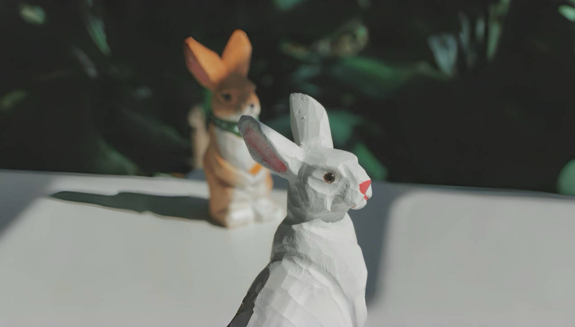 A curated group of hand-carved Wooden Smile figurines