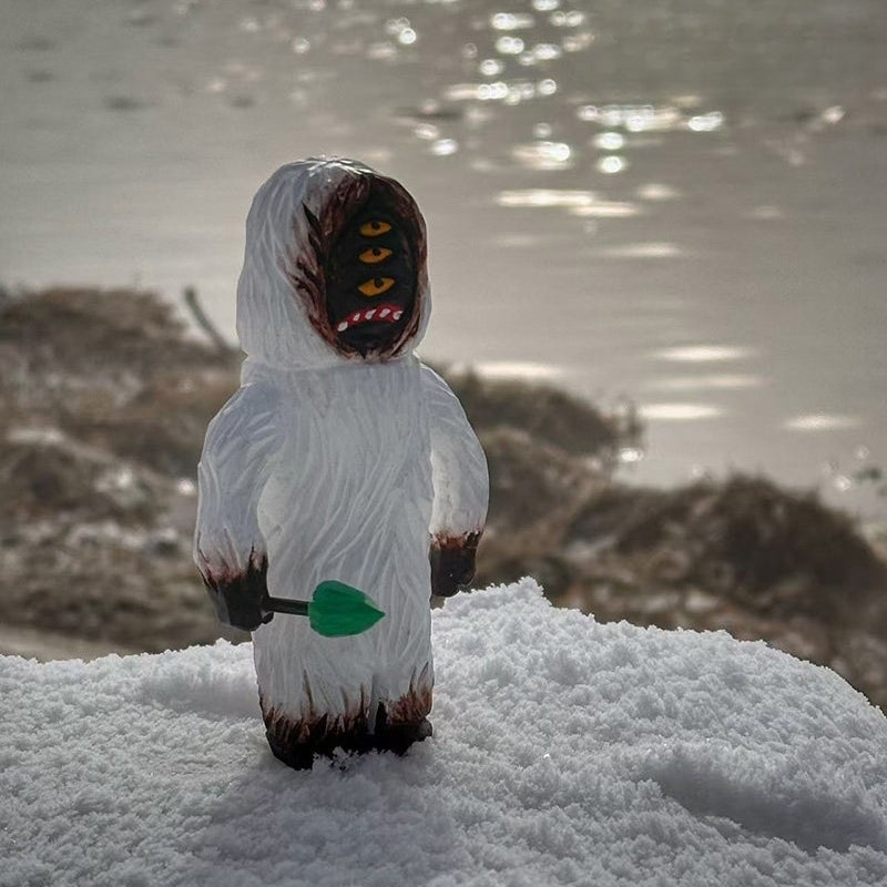 Hand painted wooden yeti figurine front view