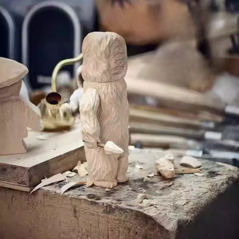 Hand carved wooden yeti figurine in progress