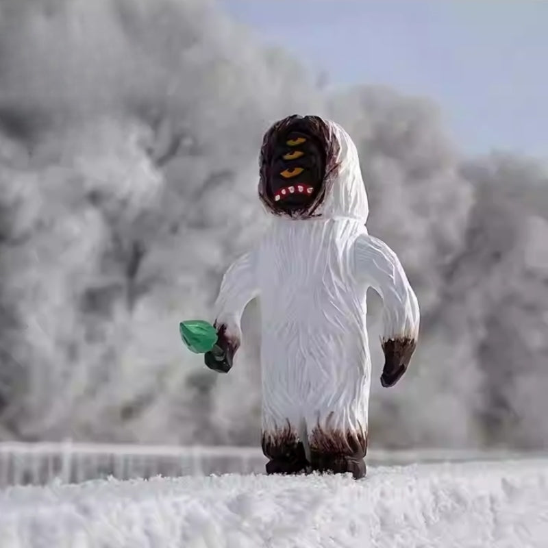 Yeti figurine on desk wooden decor